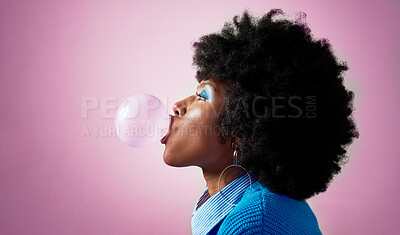 Buy stock photo Bubble gum, afro hair and black woman on pink studio background with fashion, cool or Jamaican trend hairstyle. Profile, head or beauty model with bubblegum, makeup cosmetics and bold or fun attitude