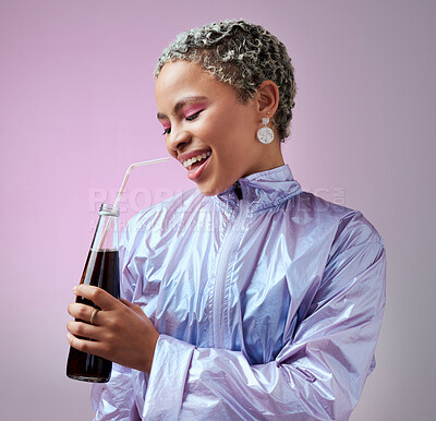 Buy stock photo Smile, cola and woman with soda in studio drinking to hydrate and refresh with a cool beverage and straw in a bottle. Happy and young girl in fancy modern clothes enjoys a cold fizzy and tasty liquid