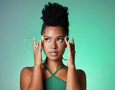 Buy stock photo Beauty, black woman and green eyeshadow makeup with thinking and focused face with mockup. Beautiful, elegant and trendy African girl with cosmetics contemplating decision or idea in studio.
