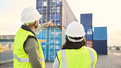 Buy stock photo Industrial managers working on a warehouse dock to export stock, containers and packages. Teamwork, collaboration and logistics industry employees discussing shipping at an outdoor cargo freight port