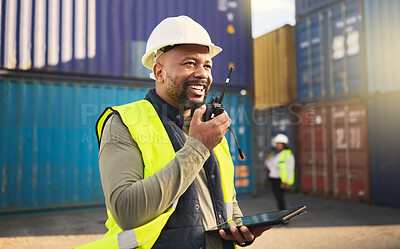 Buy stock photo Logistics, radio and a black man in shipping container yard with tablet. Industrial cargo area, happy transport worker talking on walkie talkie in safety gear and working for global freight industry.