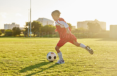 Buy stock photo Soccer, football and sports girl training on field preparing for match, game or competition on outdoors grass pitch. Health, fitness and kid kick ball learning sport for wellness, running or exercise
