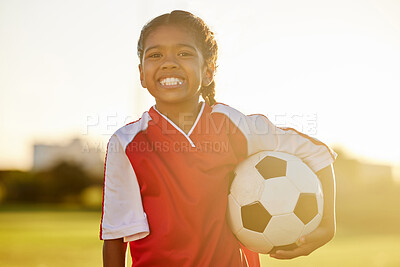 Buy stock photo Young fitness girl, football or soccer player learning, training and exercise for healthy child development. Portrait of young happy sports kid on a field or stadium practicing for a game at sunset
