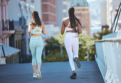 Buy stock photo Women running in the city, training for fitness and exercies to stay healthy for good cardiovascular health. Woman friends  run together, do cardio exercise in the sunshine and workout to lose weight