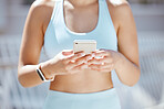 Hands of exercise woman typing on a phone, check fitness app or step tracker for exercise support on training run. Sports, marathon runner or workout girl with digital tech for help on cardio running