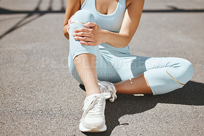 Buy stock photo Sports injury, knee pain and fitness woman sitting on tarmac road outside massaging leg for osteoporosis and fibromyalgia. Health, tired and female with orthopedic, arthritis and exercise problem
