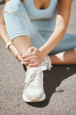 Buy stock photo Sports, injury and fitness ankle pain during exercise, running and training outside with muscle or joint. Woman, risk and hurt hands athlete holding broken leg bone with bad bruise in the street
