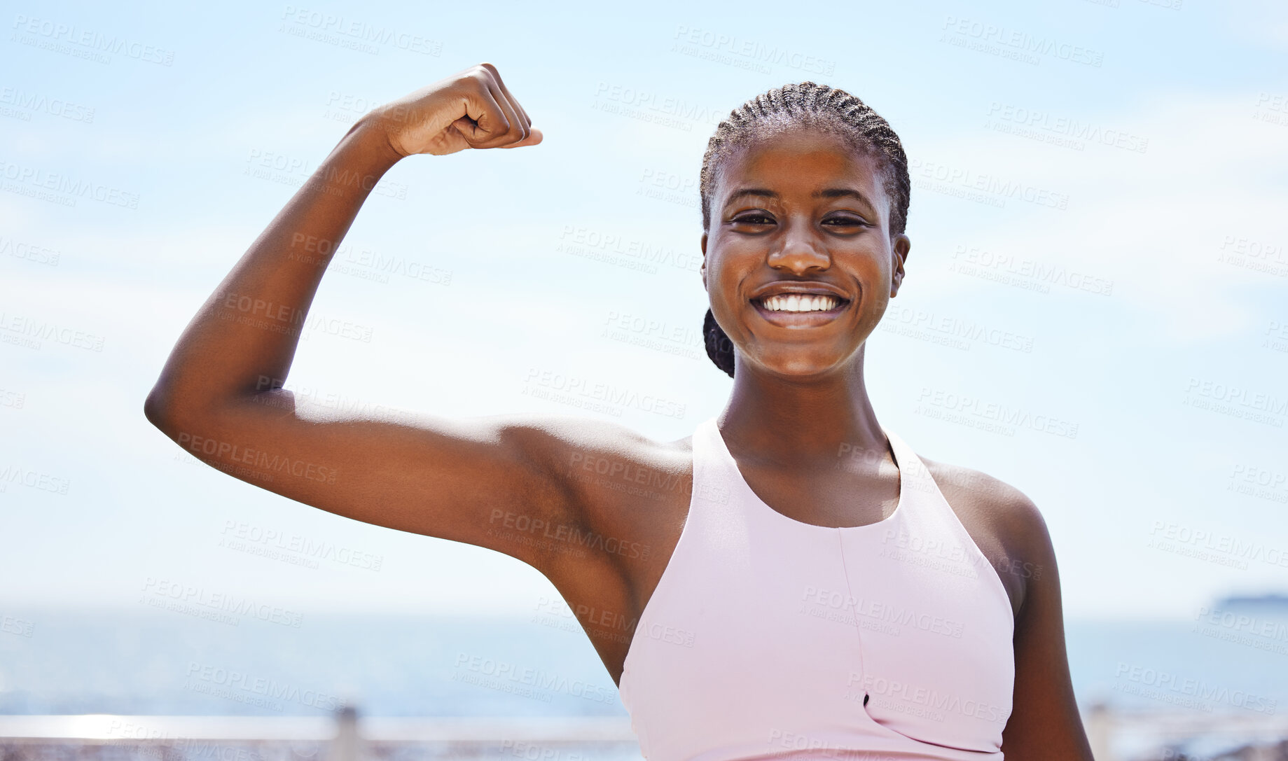 Buy stock photo Fitness, portrait and black woman flexing muscle at the beach in summer after strength training, exercise and workout. Smile, motivation and happy girl outdoors with healthy and strong arm biceps