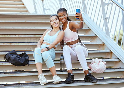 Buy stock photo Fitness, phone and friends take selfie after running, exercise and workout for social media outdoors on steps or stairs. Diversity, wellness and happy runners showing women or girls power in sports