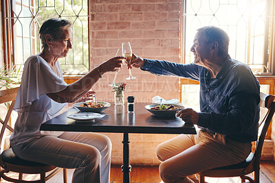 Buy stock photo Champagne, celebration and senior couple giving toast for love, anniversary or birthday with lunch at a restaurant. Elderly man and woman giving cheers with wine to celebrate marriage at a cafe