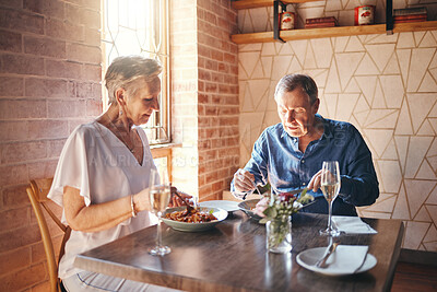 Buy stock photo Food, date and senior couple eating at fine dining restaurant and having lunch together at a table. Elderly man and woman with dinner in marriage at cafe or coffee shop during retirement for love