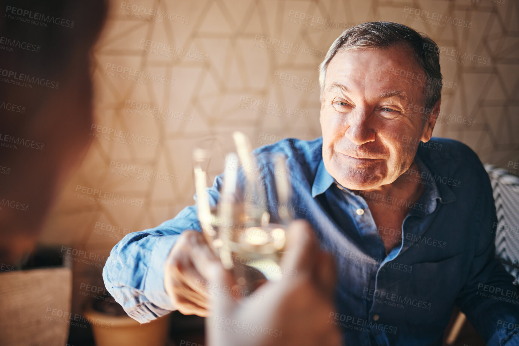 Buy stock photo Toast, glass and couple with a senior man and woman doing a cheers in celebration of their anniversary while on a date. Dating, love and retirement with an elderly pensioner drinking champagne