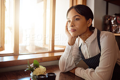 Buy stock photo Restaurant, stress and waitress thinking of future goal while frustrated working at a cafe. Tired black woman, waiter or cafe worker with burnout and idea for small business at a coffee shop