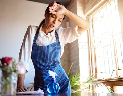 Buy stock photo Cleaning house, burnout and tired cleaner working hard on dirty table and furniture feeling exhausted. Unhappy, frustrated and sweaty woman overworked in a difficult stressful job with daily pressure