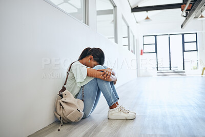 Buy stock photo Sad, depression and mental health issue of a woman university student on a floor. Fear, anxiety and study stress of a female from India feeling depressed and overwhelmed from a study fail at home