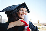 Graduation, women and students celebrate achievement with a hug, in gown and successful together as graduates. Mockup space, happy female and girls embrace to receive degree, diploma or certificate.