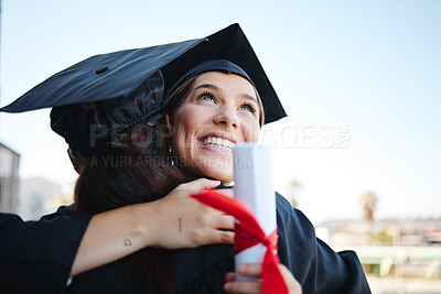 Buy stock photo Graduation, women and students celebrate achievement with a hug, in gown and successful together as graduates. Mockup space, happy female and girls embrace to receive degree, diploma or certificate.