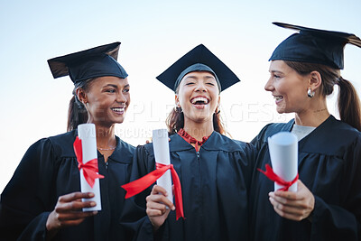 Buy stock photo Graduation, students and friends laughing and celebrating at ceremony together, happy and proud of certificate. Success, university and education goal by diverse women talking and bonding at event 