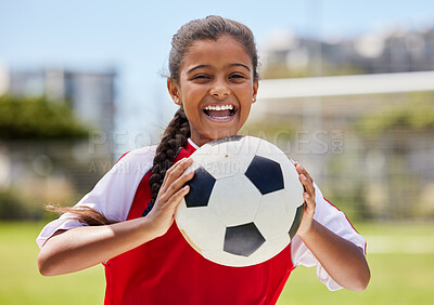 Buy stock photo Soccer, sports and happy Indian girl athlete holding a sport ball on a school field. Portrait of fitness, football and exercise of a child smile excited about training, workout and game motivation 