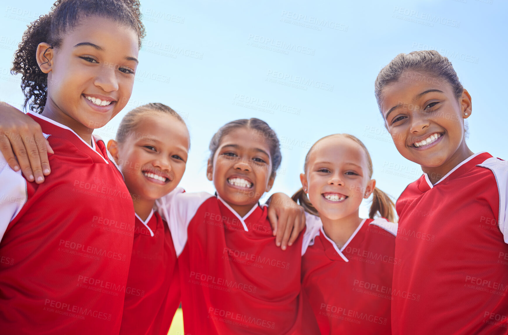 Buy stock photo Girl team, in soccer and happy with teamwork and team building at stadium. Friends, diversity and collaboration in sports motivation for fitness, bonding, exercise and training. Smile in portrait. 