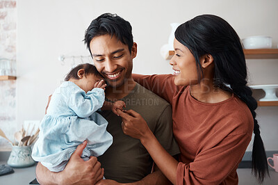 Buy stock photo Love, baby and happy parents bonding and caring for their infant child in their comfy home. Happiness, smile and care with an interracial family, man and woman standing together in New york house