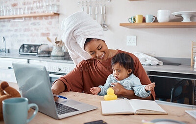 Buy stock photo Down syndrome, baby and laptop with mother working in a kitchen, bonding and doing research on child development. Learning, freelance and disability care with remote business woman multitasking 