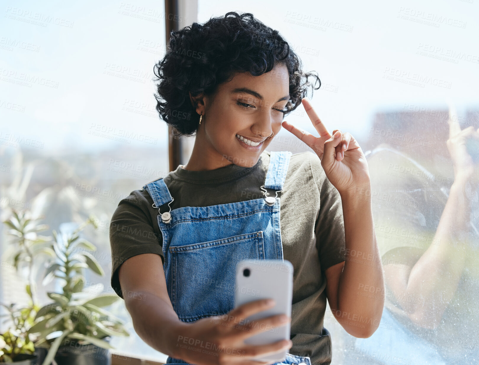 Buy stock photo Student woman and smartphone selfie with peace hand for social media leisure picture with smile. Young, happy and indian hipster girl enjoying break with phone photograph for internet app. 
 