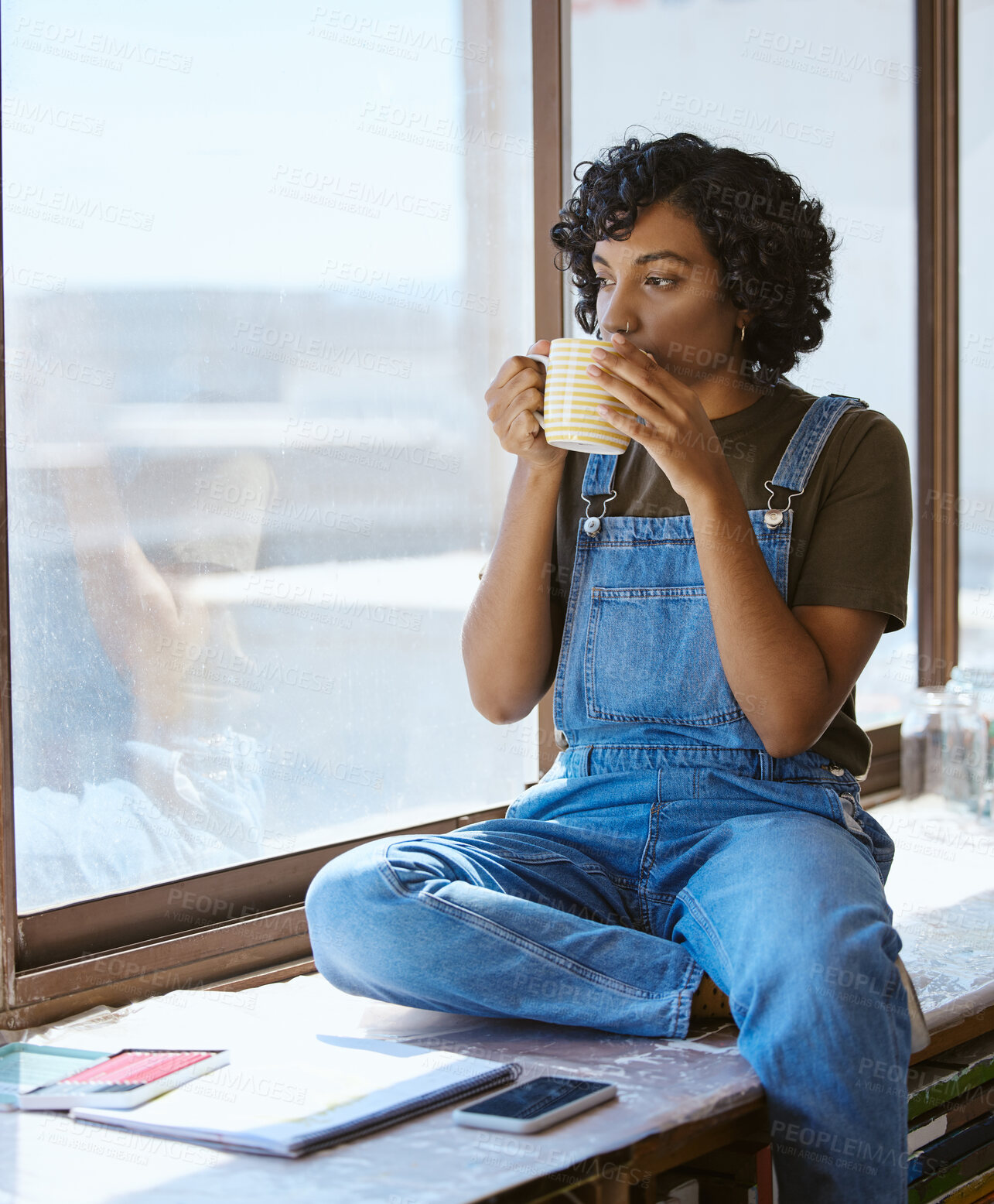 Buy stock photo Woman, coffee or thinking by window in creative studio, Indian art gallery or painting workshop with phone or notebook. Artist, designer or painter with technology, ideas or innovation vision and tea