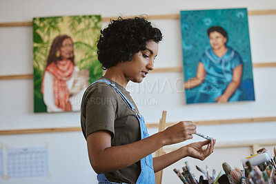 Buy stock photo Creative, art and woman thinking in studio with choice of brush for next painting, artwork or design sketch. Planning, decision and Indian female vision or ideas for drawing inspiration in home. 


