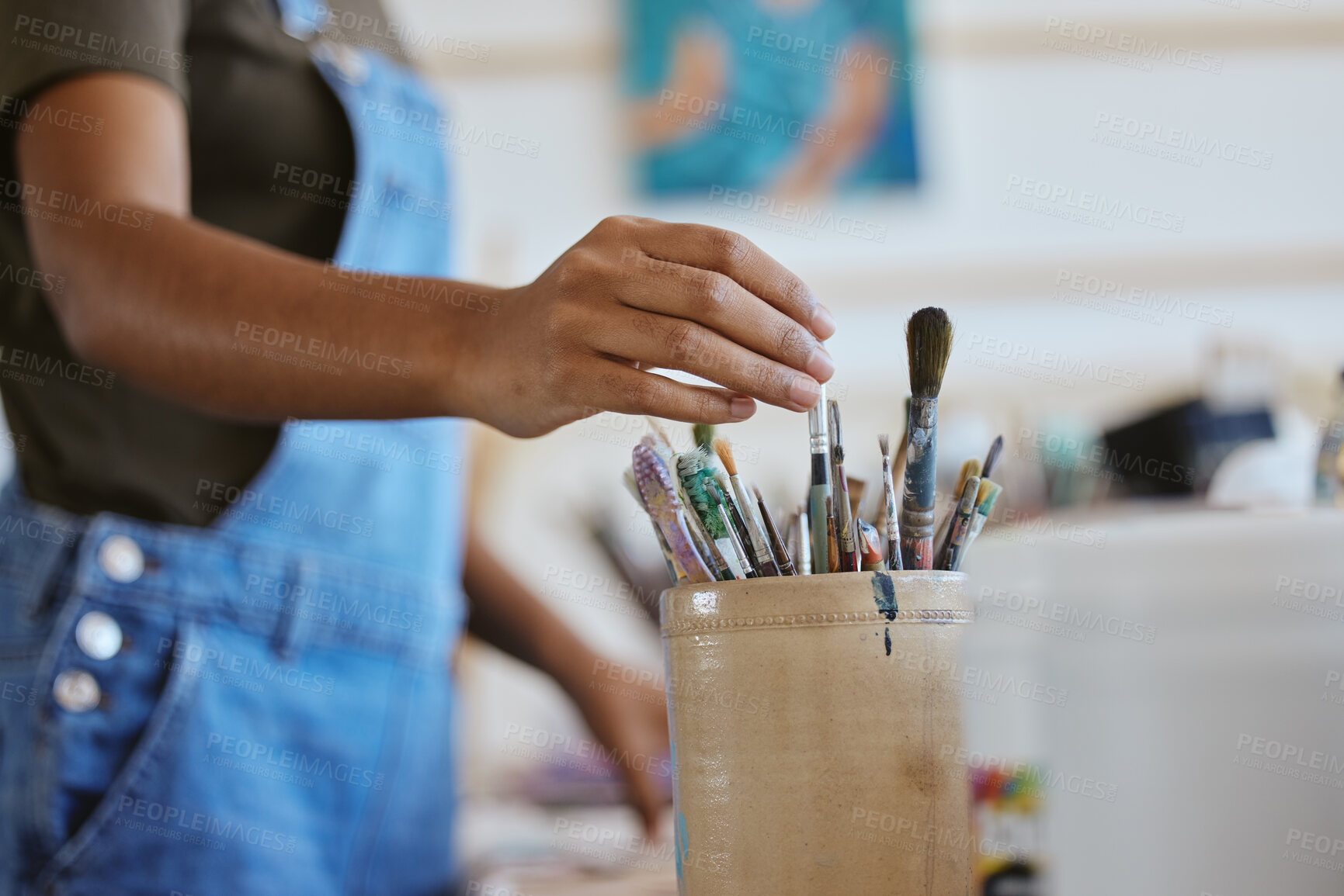 Buy stock photo Woman, artist and hand of painter reaching for paintbrush in studio, creative workshop or art class painting. Closeup of female doing artwork and craft as hobby with a brush set or collection inside