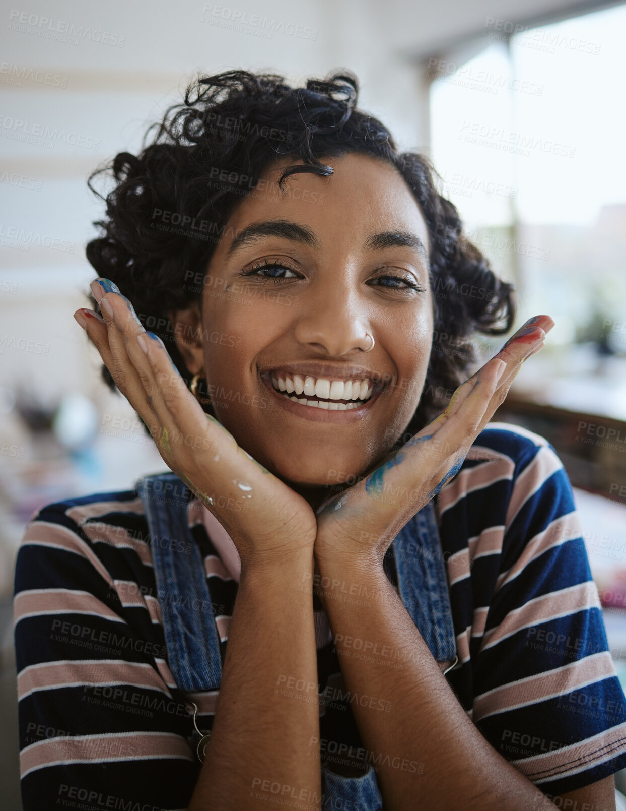 Buy stock photo Face portrait, woman artist and creative with paint on hands after painting in art school. Creativity, smile and designer, painter and female Indian student learning in university studio workshop.

