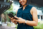 Email, happy and business woman in the city of Singapore typing on a mobile app on a phone for work. Corporate employee with a smile for communication and networking on smartphone in the morning