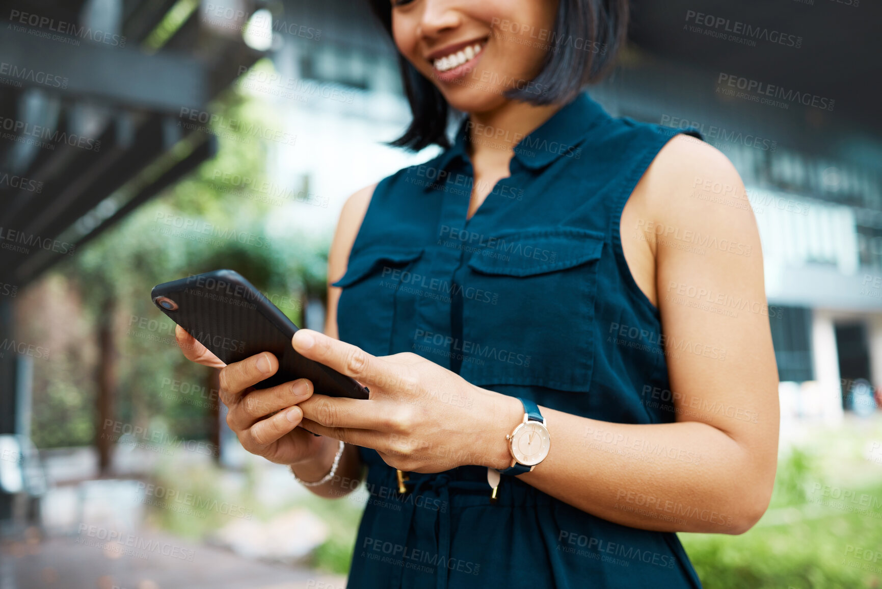 Buy stock photo Email, happy and business woman in the city of Singapore typing on a mobile app on a phone for work. Corporate employee with a smile for communication and networking on smartphone in the morning
