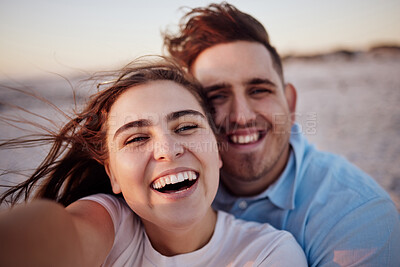 Buy stock photo Couple, smile and beach together for selfie with happiness on face on holiday, honeymoon or vacation. Man, girl and happy at ocean on travel in summer in romantic photo for love, bonding and care