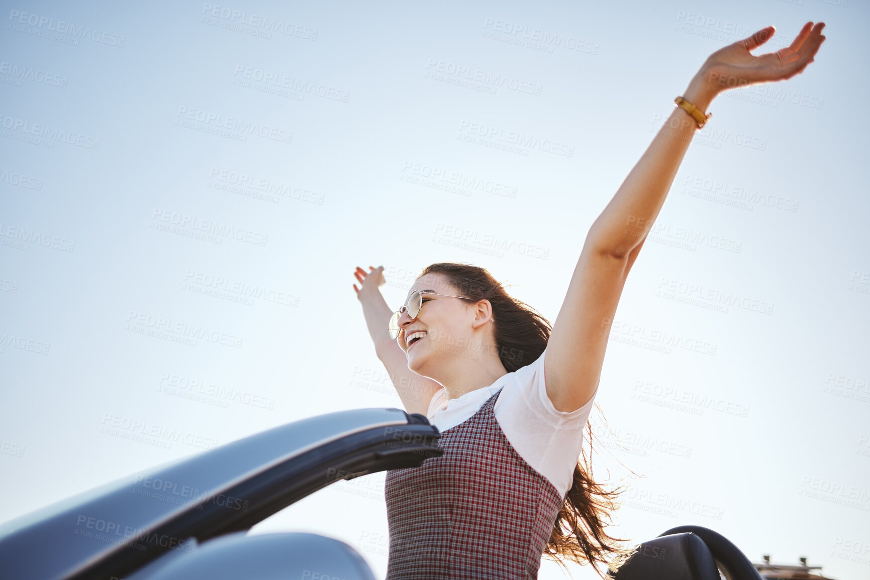 Buy stock photo Road trip, celebrate drive and woman in car on blue sky summer mock up for journey, freedom and happiness. Young girl with cheer enjoy fresh air in modern motor for outdoor travel vacation or holiday