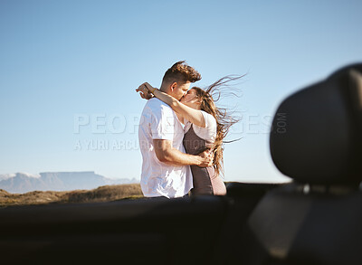 Buy stock photo Couple, love and kiss on nature road trip, vacation or summer holiday outdoors in Canada. Romance, affection and happy man, woman and hug spending quality time together, bonding and kissing by car. 
