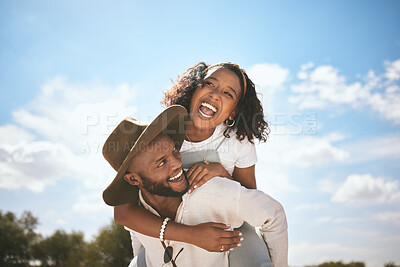 Buy stock photo Piggyback, love and couple with smile on a date in nature together during summer. Happy, playful and African man and woman beeing funny, crazy and young in a green park or garden during spring