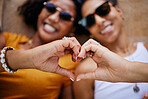 Heart sign, lgbtq couple and women happy, smile and show relationship together being romantic. Love, queer, or friends or proud black girls celebrate loving, romance or peace while relax with passion