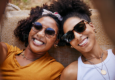 Buy stock photo Woman, relax and friends smile for selfie together in happiness with glasses for joyful friendship. Happy black women relaxing for summer vacation or break smiling for fun adventure with friend