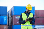 Logistics, digital tablet and black man in supply chain management at shipping, cargo or freight warehouse. Industrial engineer worker with software app for export, distribution or storage technology