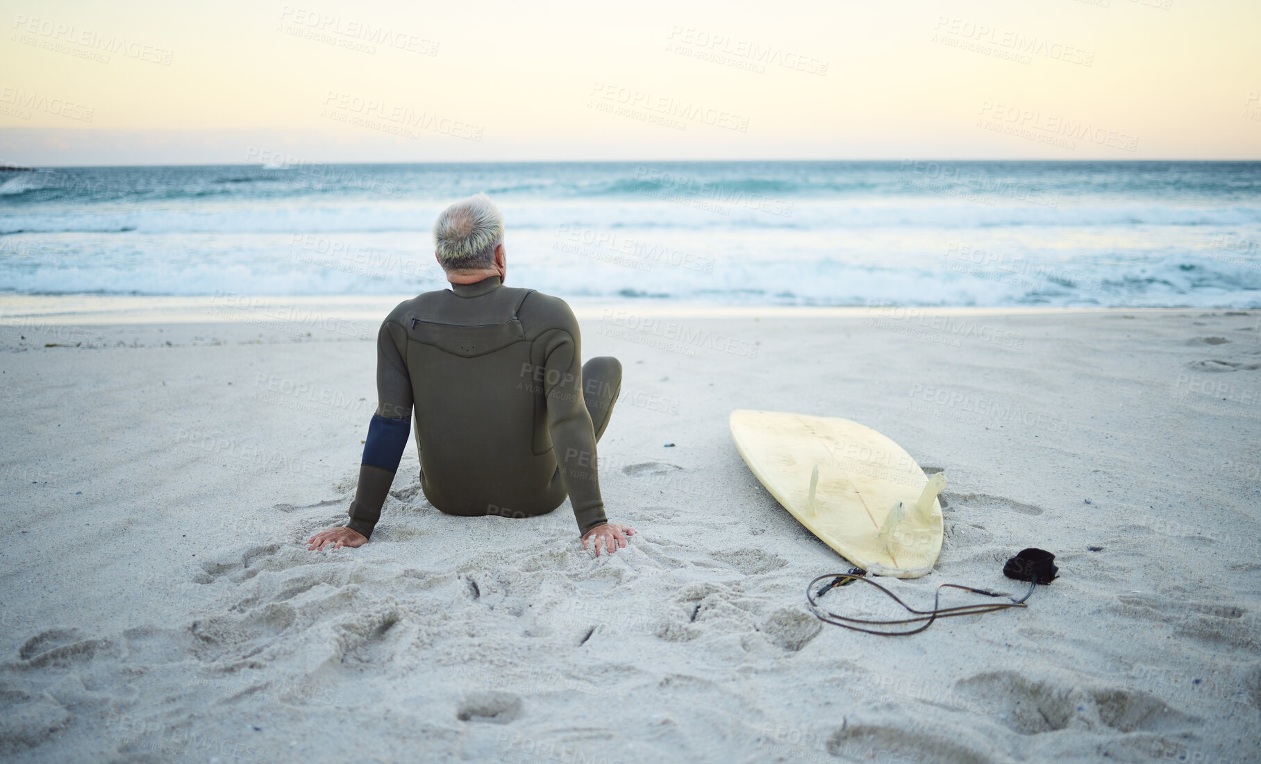 Buy stock photo Beach, back view and old man surfer on holiday vacation in retirement relaxing and chill on ocean sand in Portugal. Surfing, senior and healthy person with surfboard watching waves at sea outdoors