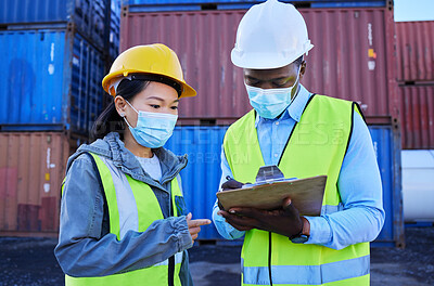 Buy stock photo Covid, documents and supply chain logistics with a team working in shipping on a commercial container dock. Teamwork, freight and cargo with a man and woman courier filling out an order or shipment