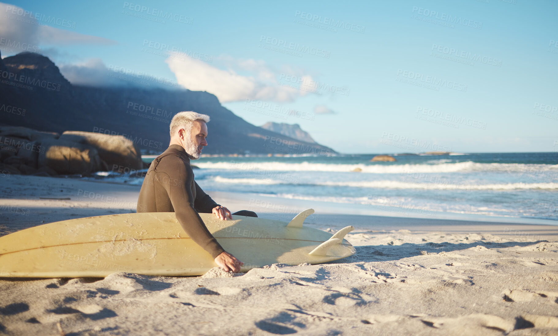 Buy stock photo Surf, relax and senior man on the beach for sports, surfing and fun exercise for health, wellness and ocean sea freedom. Peace, sand and surfer chill after fitness or surf board training in Portugal