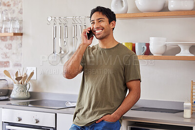 Buy stock photo Asian man, communication and phone call in kitchen while laughing, happy and talking to contact with 5g network at home. Male with a smile while networking and having conversation about good service