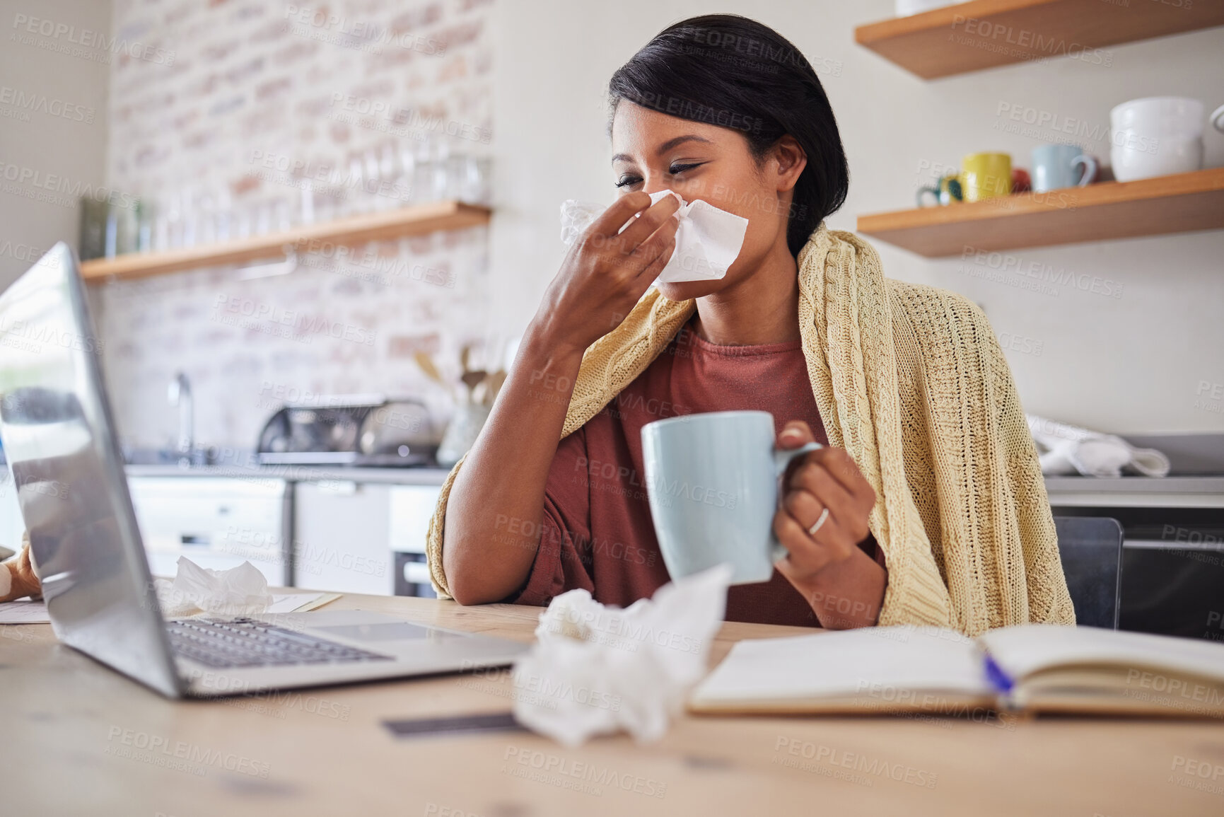 Buy stock photo Sick, tea and business woman with covid while reading an email on a laptop and working from house. Remote entrepreneur blowing nose with flu and drink of coffee while planning work on web in her home