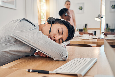 Buy stock photo Tired call center worker sleeping at desk, burnout from working at telemarketing company and stress from consulting with people online on computer. Customer service employee with sleep problem