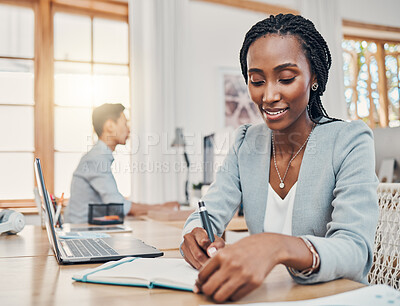 Buy stock photo Black, business woman and writing in notebook for planning schedule or idea working in the office. Happy African American female employee taking notes for corporate finance at the workplace