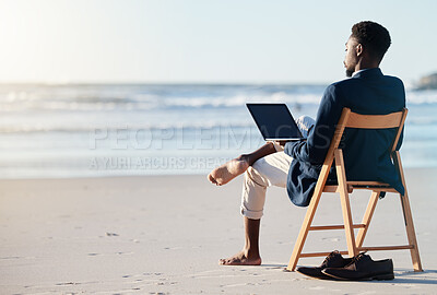 Buy stock photo Beach vacation, work travel and black man doing business on holiday reading an email with 5g internet while working by ocean. Relax, break and happy African male doing remote work on a chair in Bali