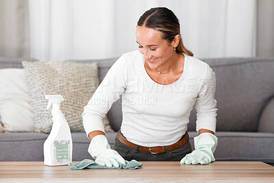 Buy stock photo Living room, cleaner and woman cleaning table with product, spray bottle and rubber gloves in modern home. Happy worker in apartment using soap liquid, hygiene detergent for spring clean service