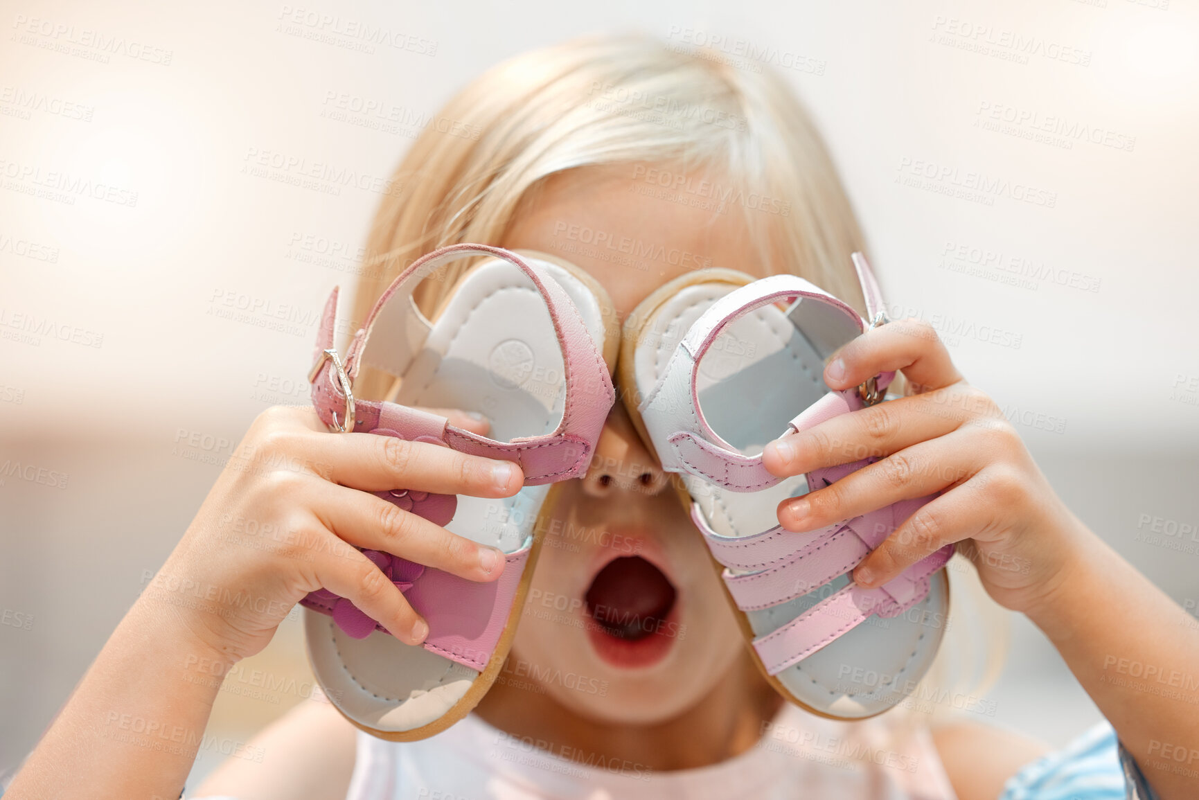 Buy stock photo Girl child shopping for shoes, wow discount price in retail store and funny crazy face. Excited, young kid in boutique toddler sale, future footwear designer holding sandals and pink surprise gift